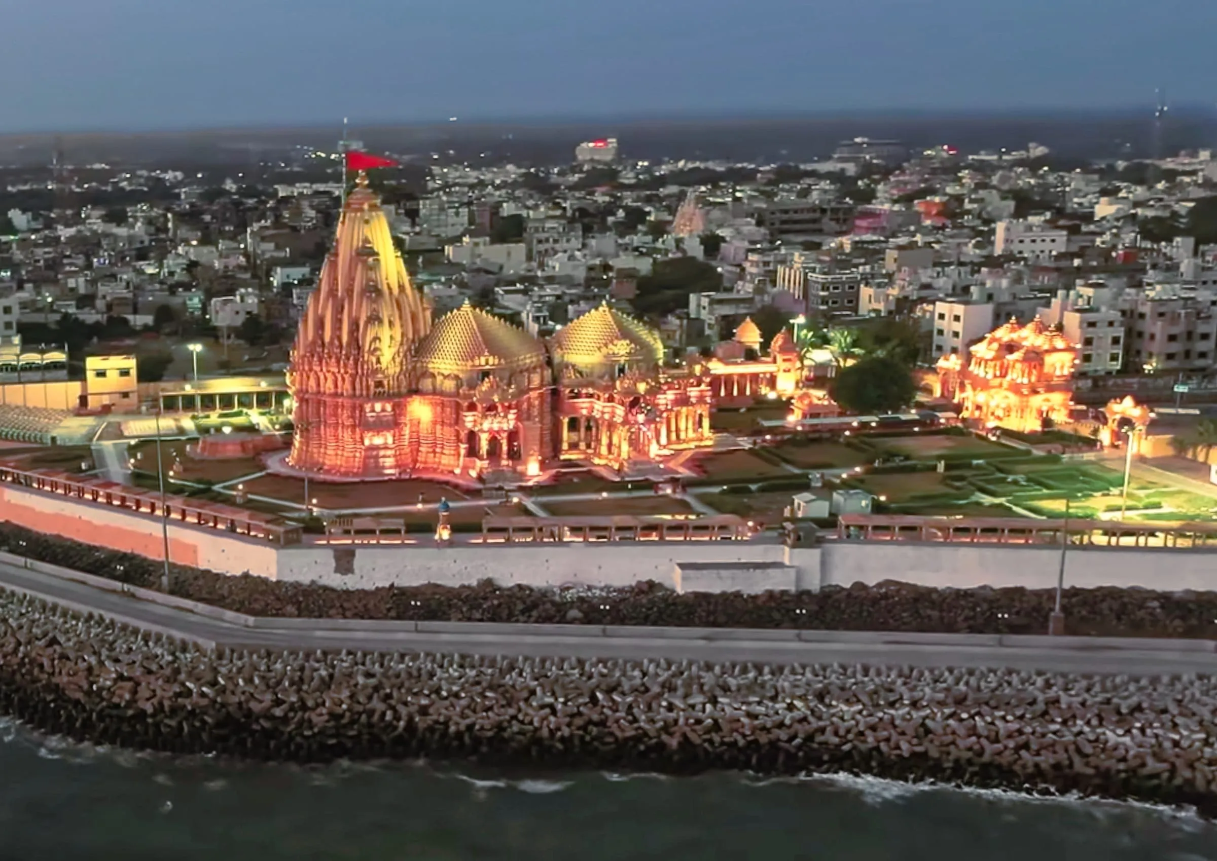 Aerial view of Somnath Temple on the coast at Prabhas Patan, with the sea beyond