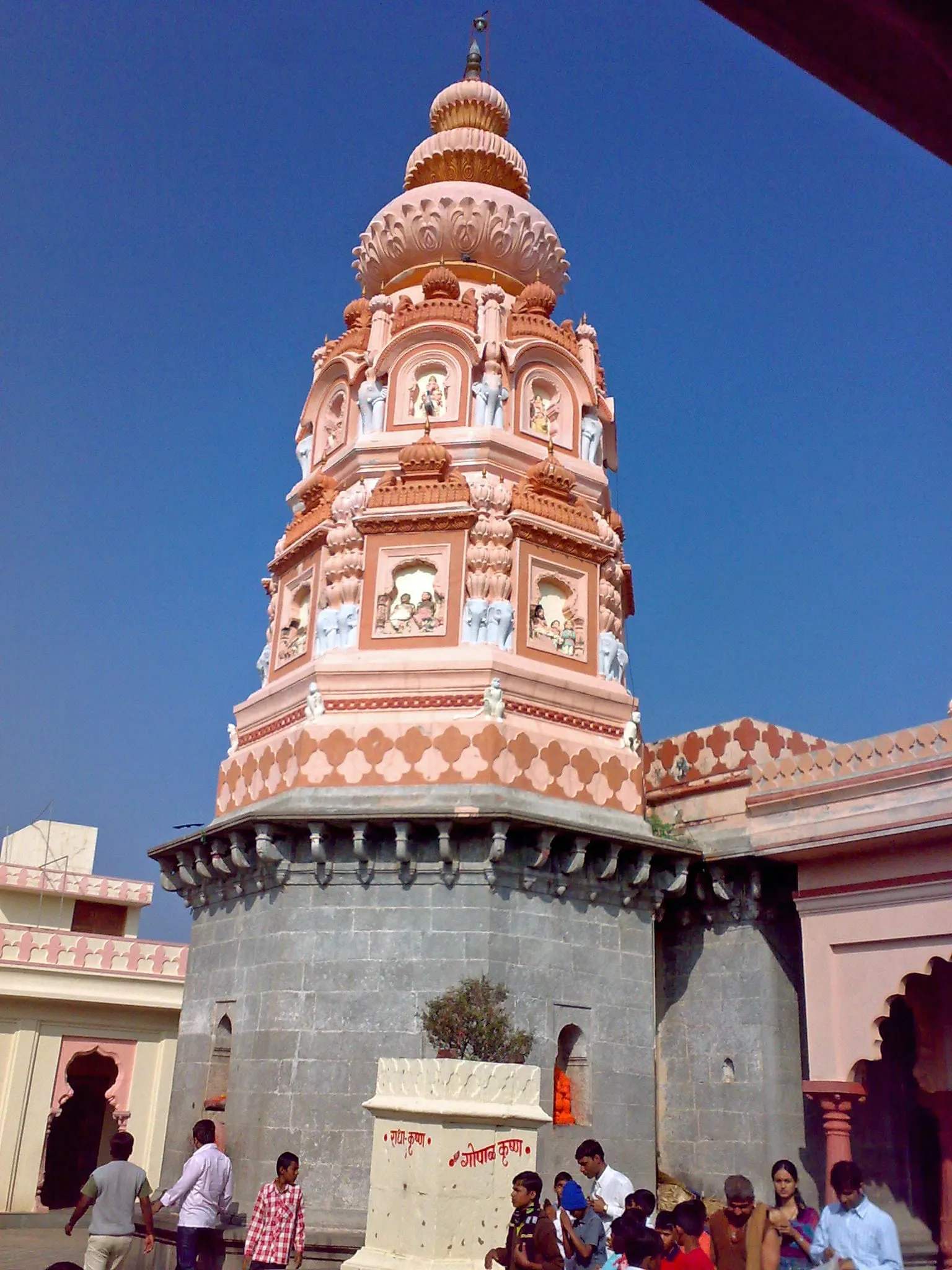 The painted gateway and towers of the Mayureshwar temple at Morgaon