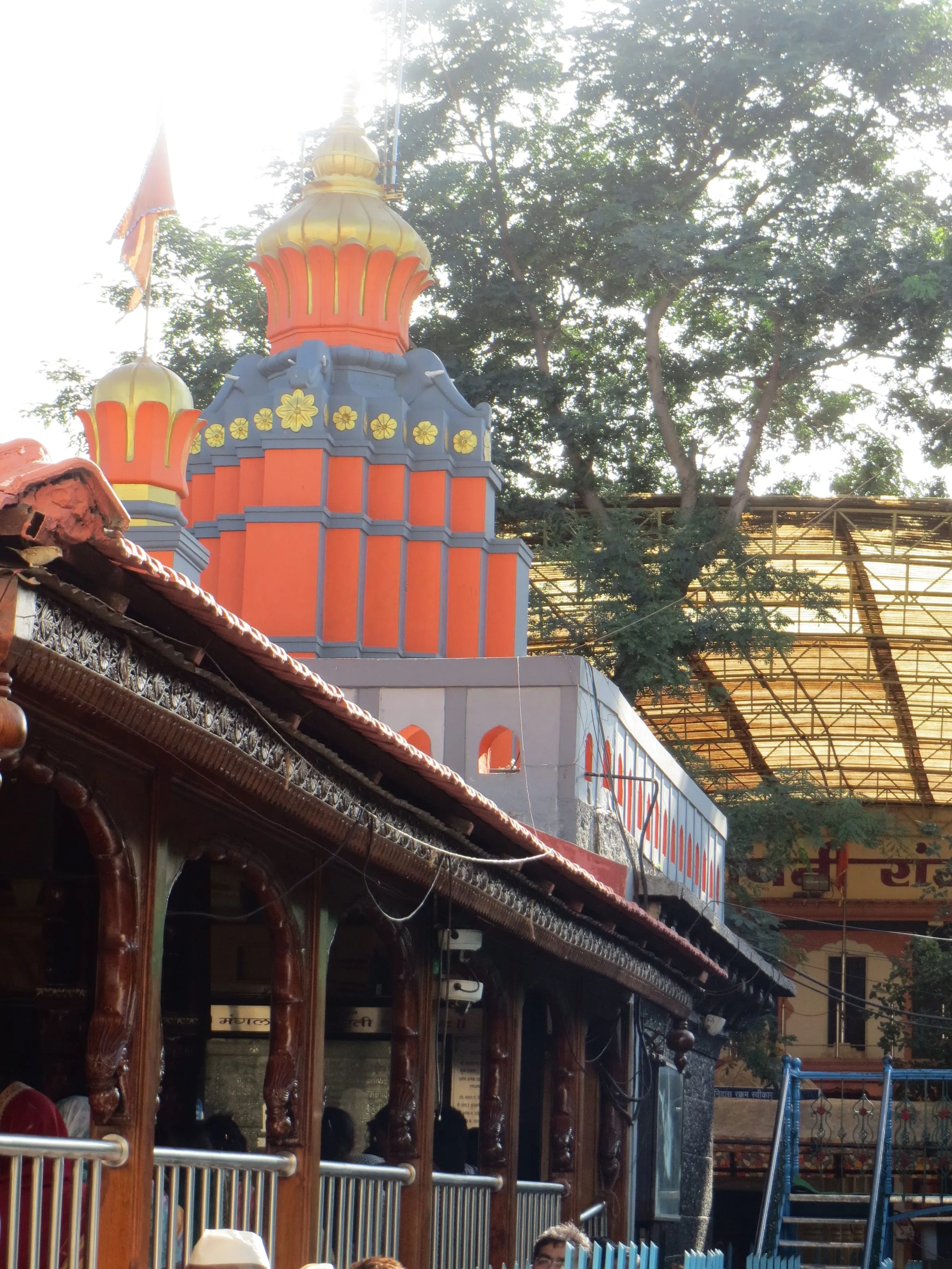 The orange spire of the Mahaganapati temple at Ranjangaon