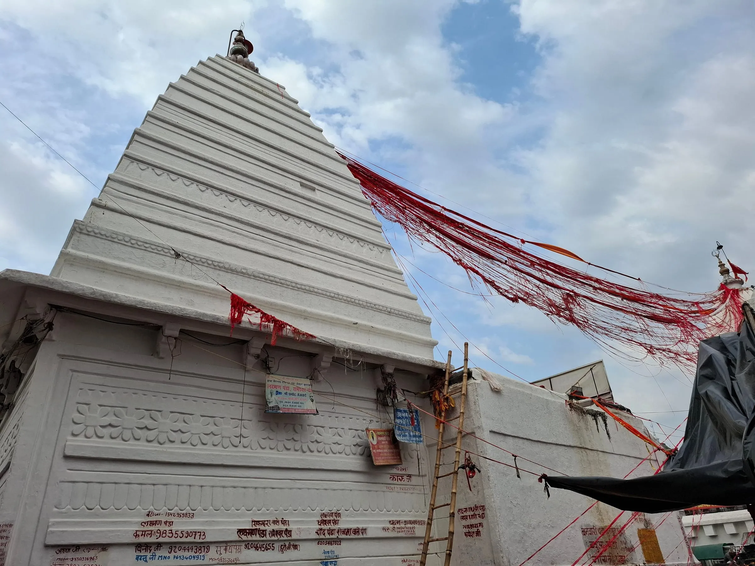 The main spire of the Baidyanath temple, hung with red ribbons