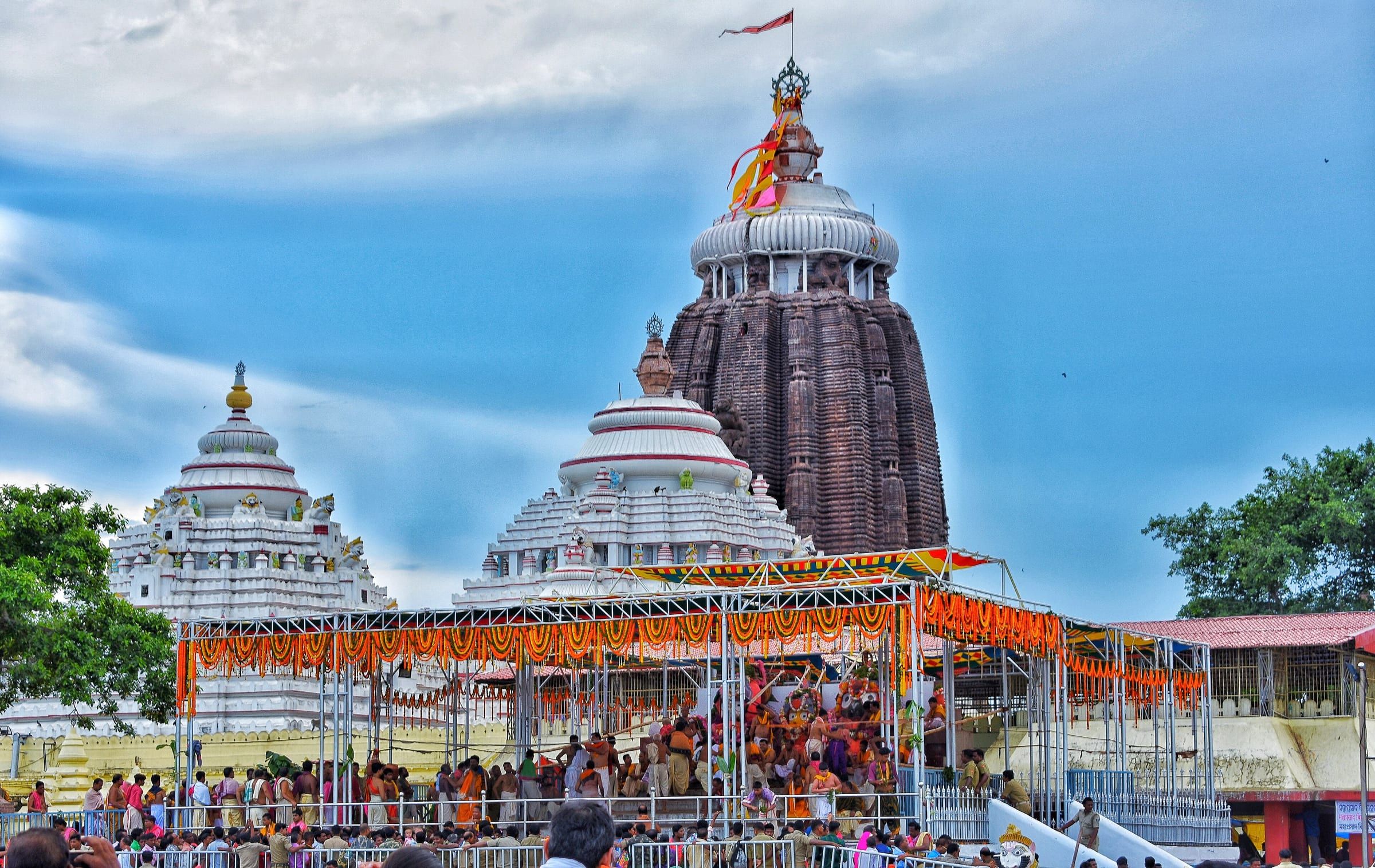 Jagannath Temple in Puri, its tall spire and flags above the outer wall
