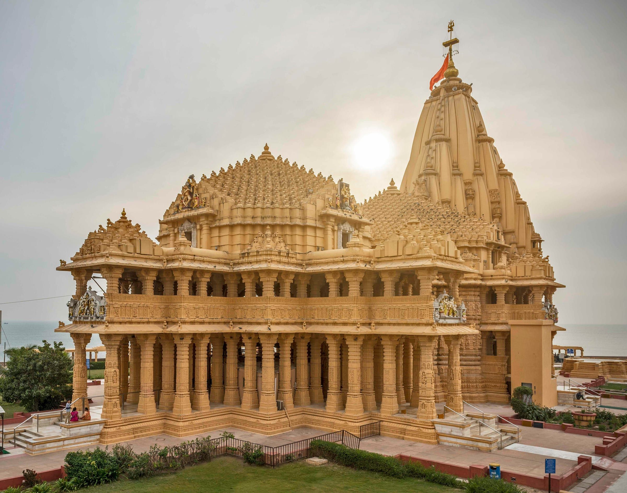 Somnath Temple's carved sandstone spire and halls against the sky